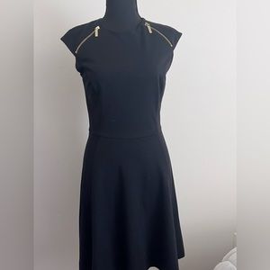 Michael Kors Black A Line Dress. Size 4. Good Condition. Shoulder zipper design.